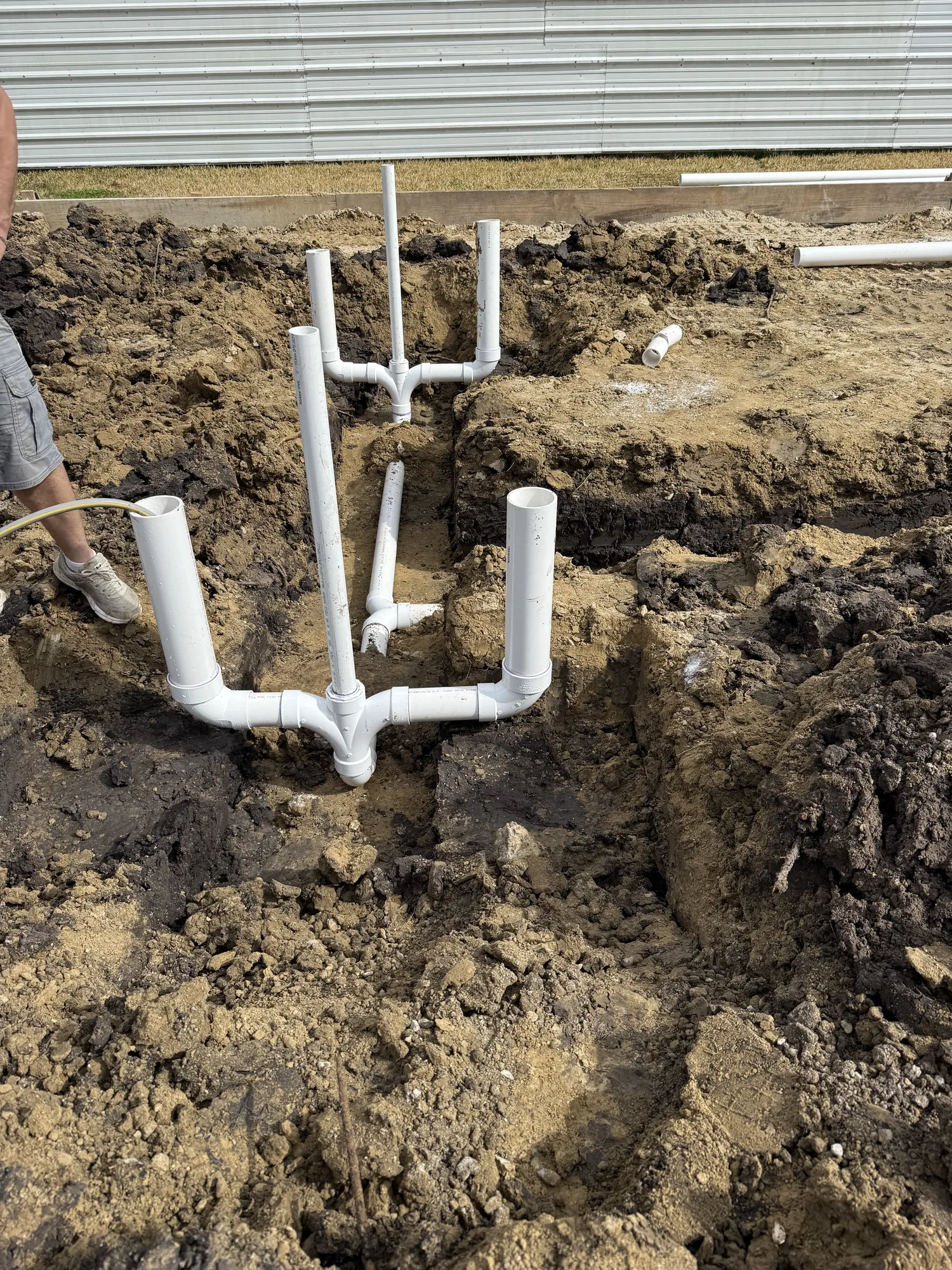 Commercial drain line rough-in set before the slab pour in Port Neches, TX