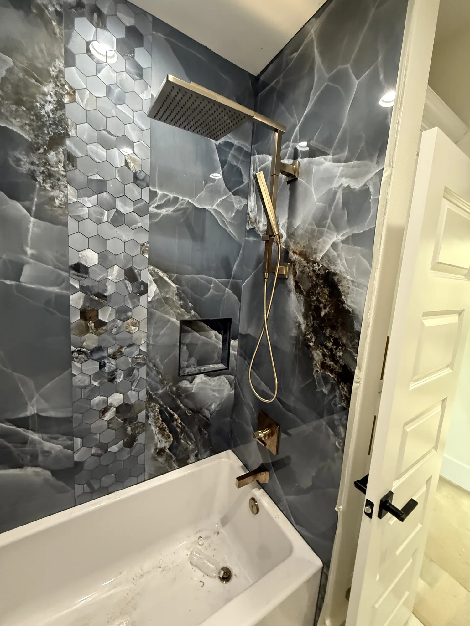 Shower valve and trim installed in a new construction home in Port Neches, TX