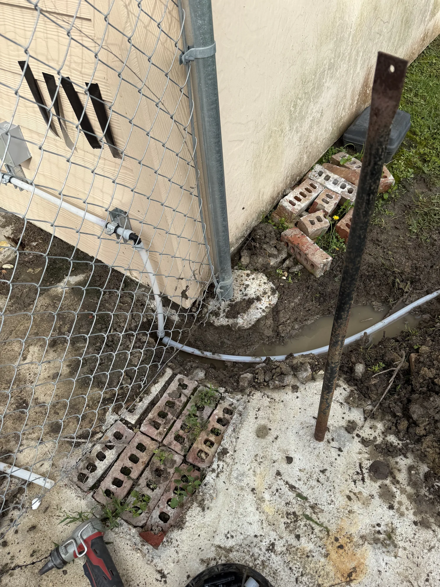 New main water line run along a building in Beaumont, TX