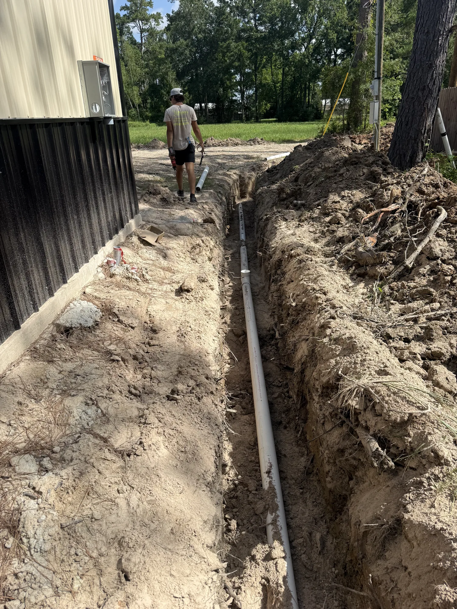 Open trench for a new residential sewer line in Sour Lake, TX