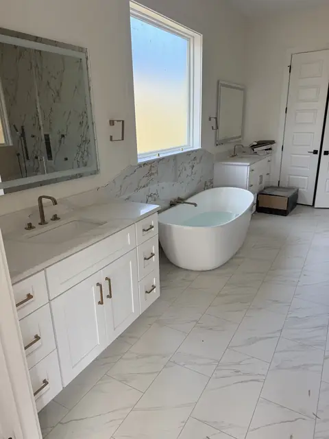 Freestanding tub and filler set in a new construction primary bath in Port Neches, TX
