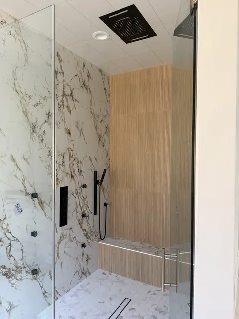 Walk-in shower plumbed and trimmed in a new construction home in Port Neches, TX