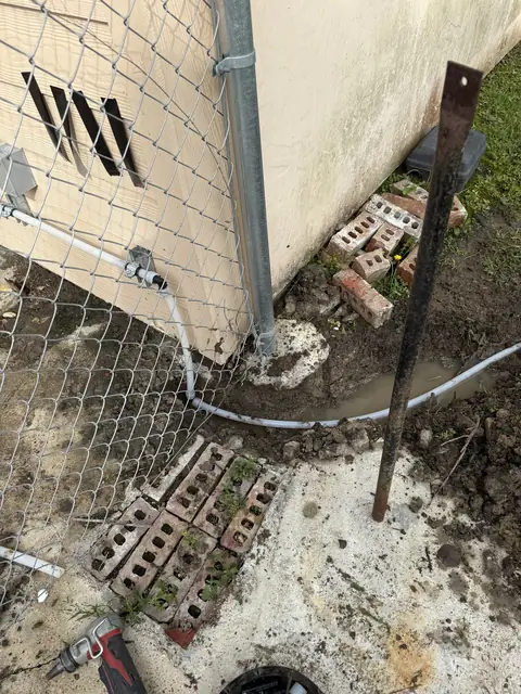 New main water line run along a building in Beaumont, TX