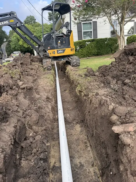New PVC sewer line laid in an open trench in Port Acres, Port Arthur, TX