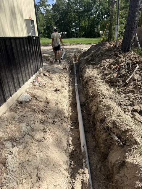 Open trench for a new residential sewer line in Sour Lake, TX