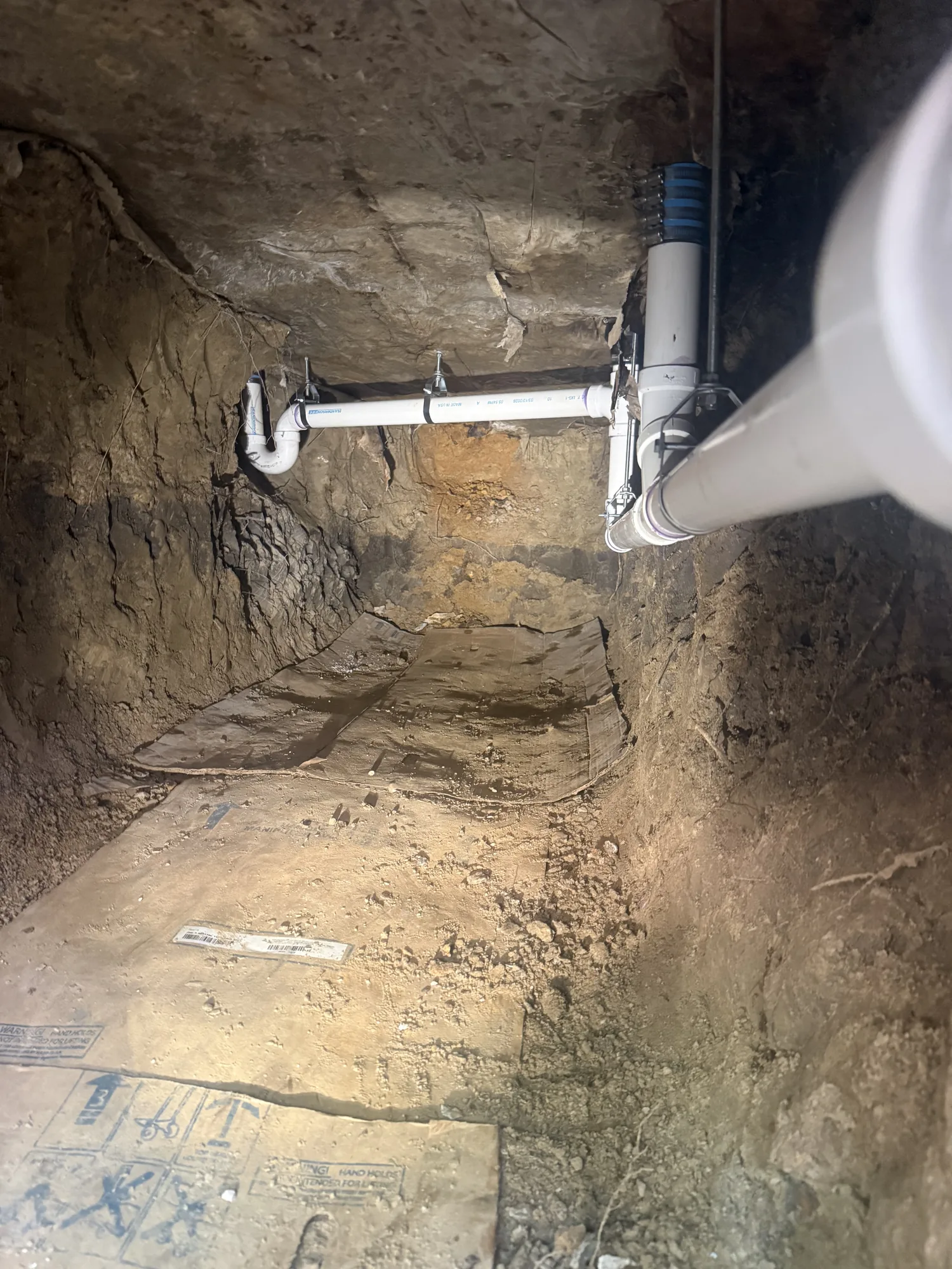 Under-slab tunnel dug for residential plumbing repair in Groves, TX