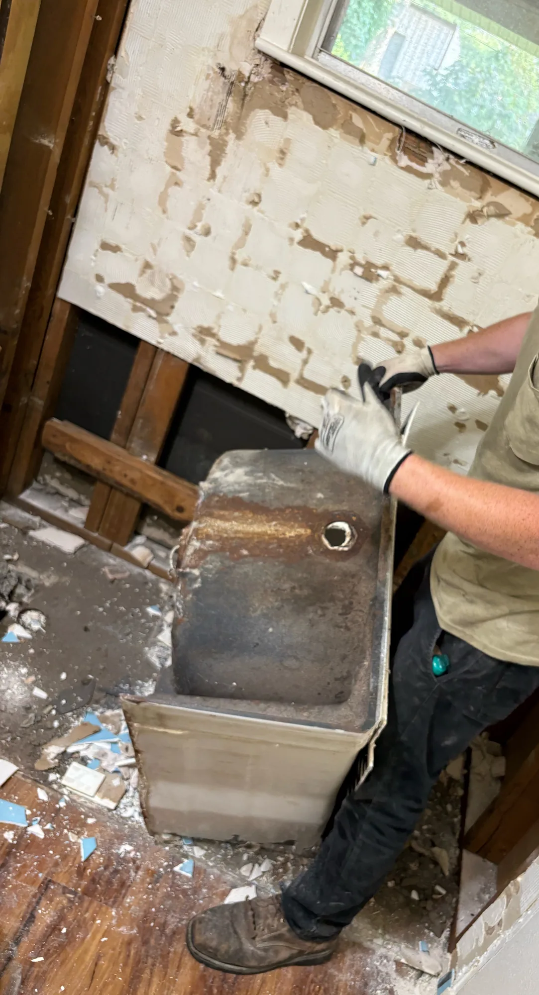 Bathroom stripped to the studs for an emergency walk-in shower conversion in Orange, TX